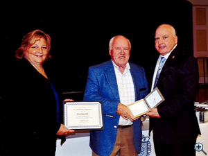 Ed Daly of Pridestar EMS accepts community partner award